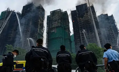 Число погибших при пожаре в Гонконге достигло 94 человек
