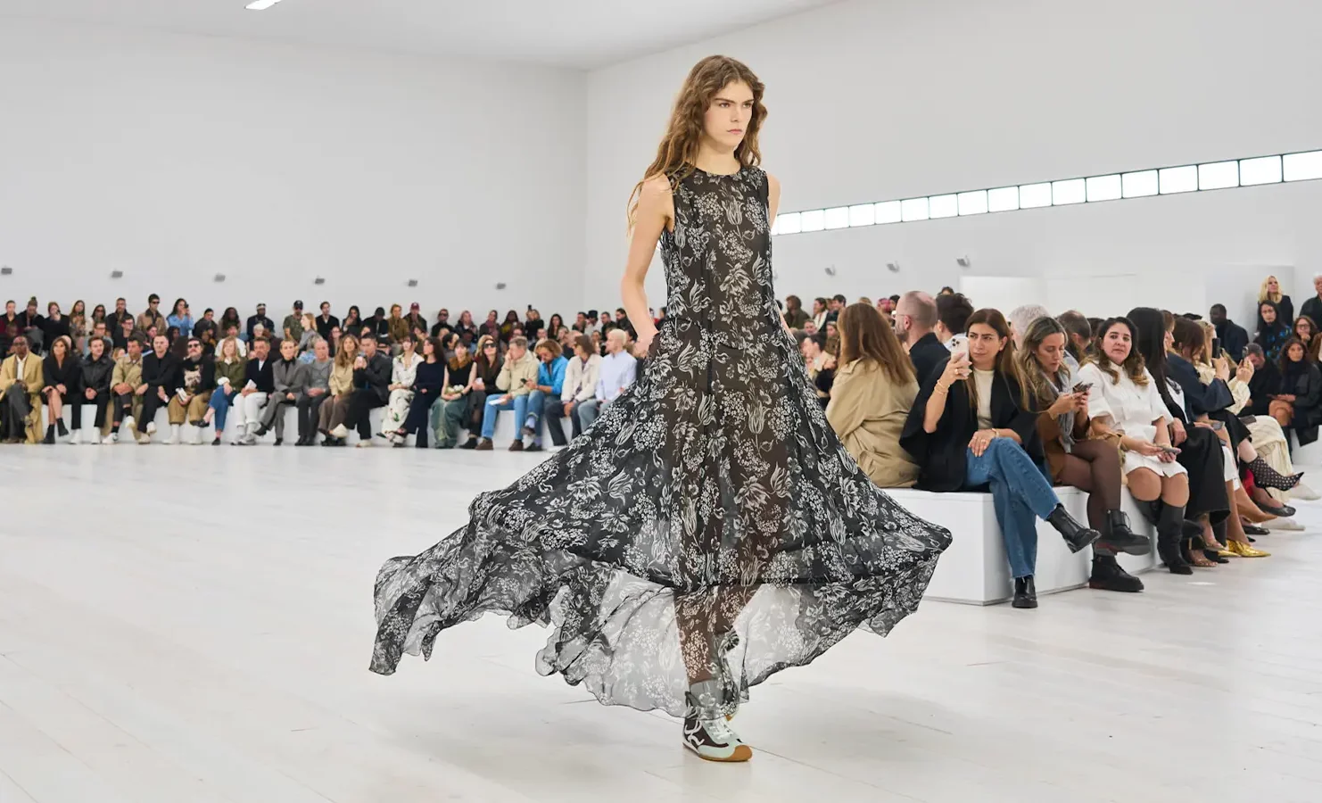 depositphotos_165782396-stock-photo-models-walk-runway