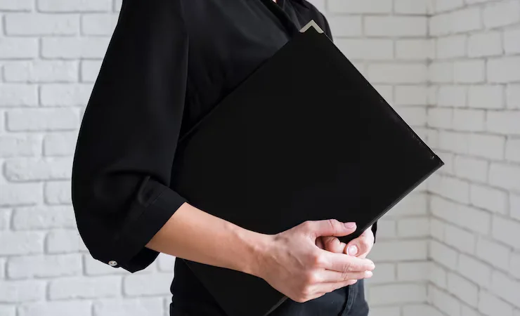 business-female-holding-clipboard_23-2148411872.avif