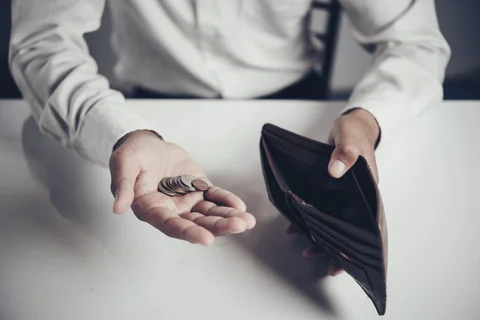 businessman-saving-money-scaled.jpg