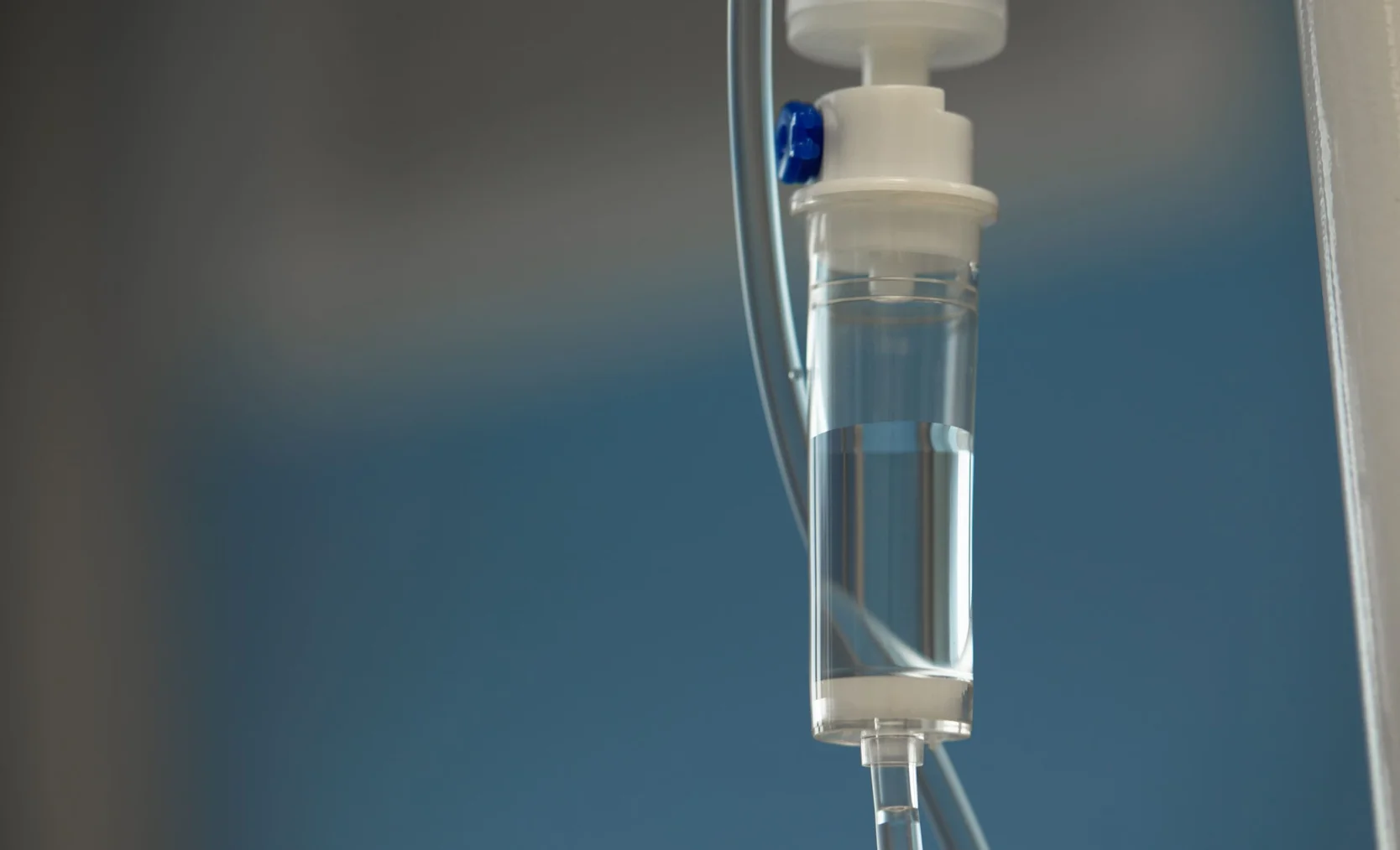 closeup-iv-tube-action-dropper-with-drug-slowly-dripping-down-tube-iv-tubes-sick-patient-after-surgery-1-scaled.jpg