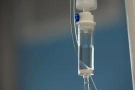 closeup-iv-tube-action-dropper-with-drug-slowly-dripping-down-tube-iv-tubes-sick-patient-after-surgery-1-scaled.jpg
