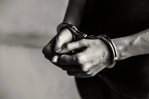 criminal-handcuffs_53876-139638 (2).avif