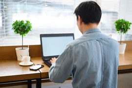 high-angle-male-working-laptop_23-2148468680.avif