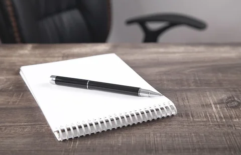 notepad-pen-business-desk_220873-3758.jpg