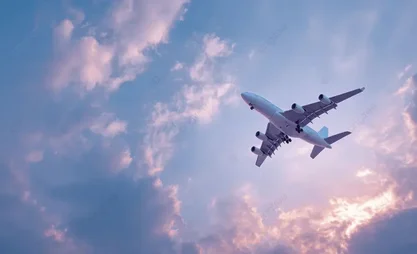 pngtree-a-large-passenger-airplane-flying-in-the-sky-at-sunset-with-image_17905555.webp