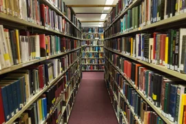 volumes-books-bookshelf-library-scaled.jpg