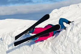 woman-fell-skis-from-mountain-snow-highrisk-activity-extreme-sport-insurance-concep_174533-2705.avif
