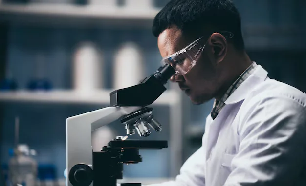 young-scientist-working-with-microscope-laboratory-young-scientist-doing-some-research_33755-7526.avif